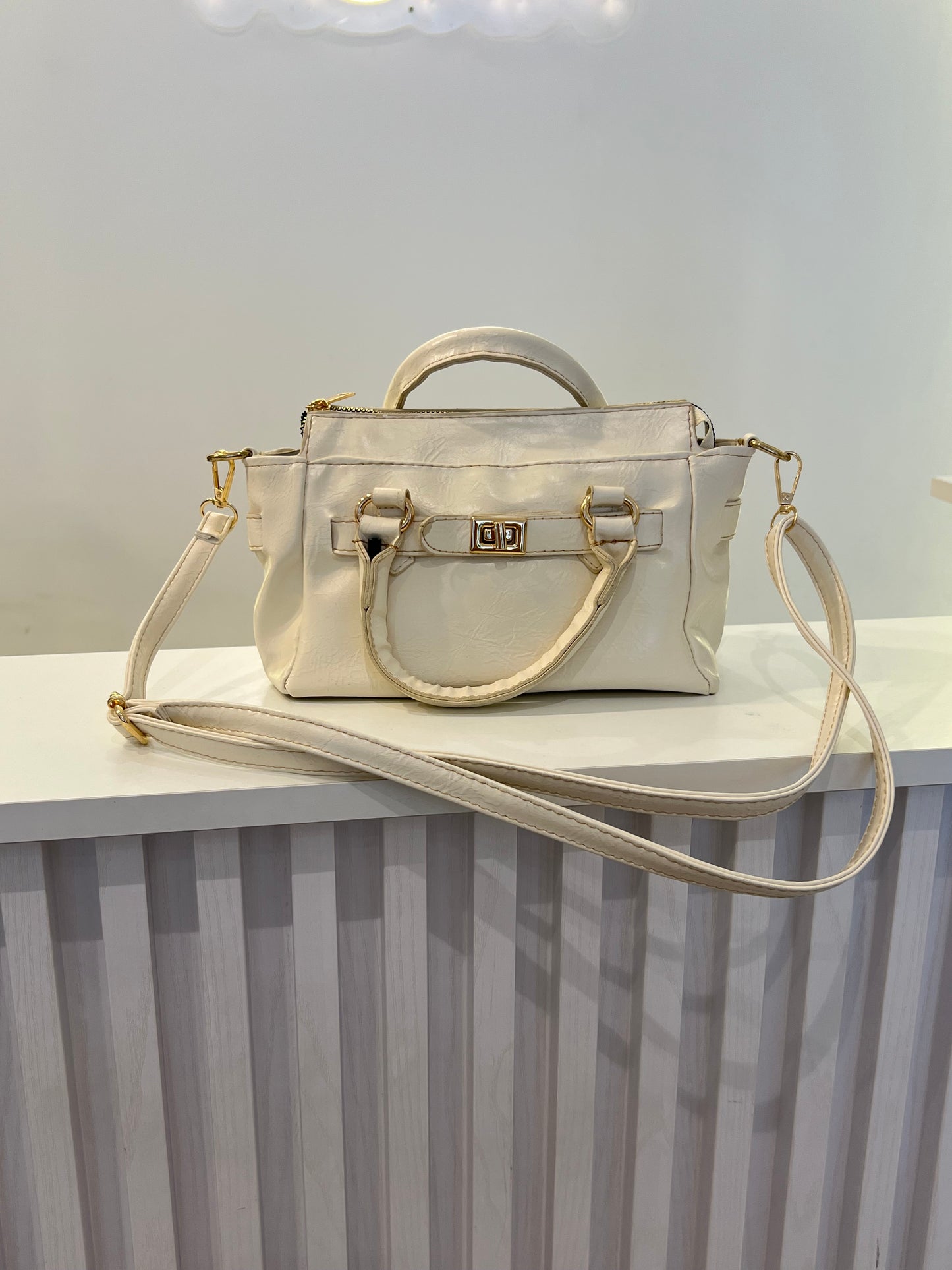 The Ivory Satchel